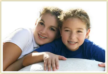 sisters smiling