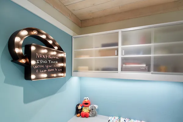 Big sign over a few toys in the office